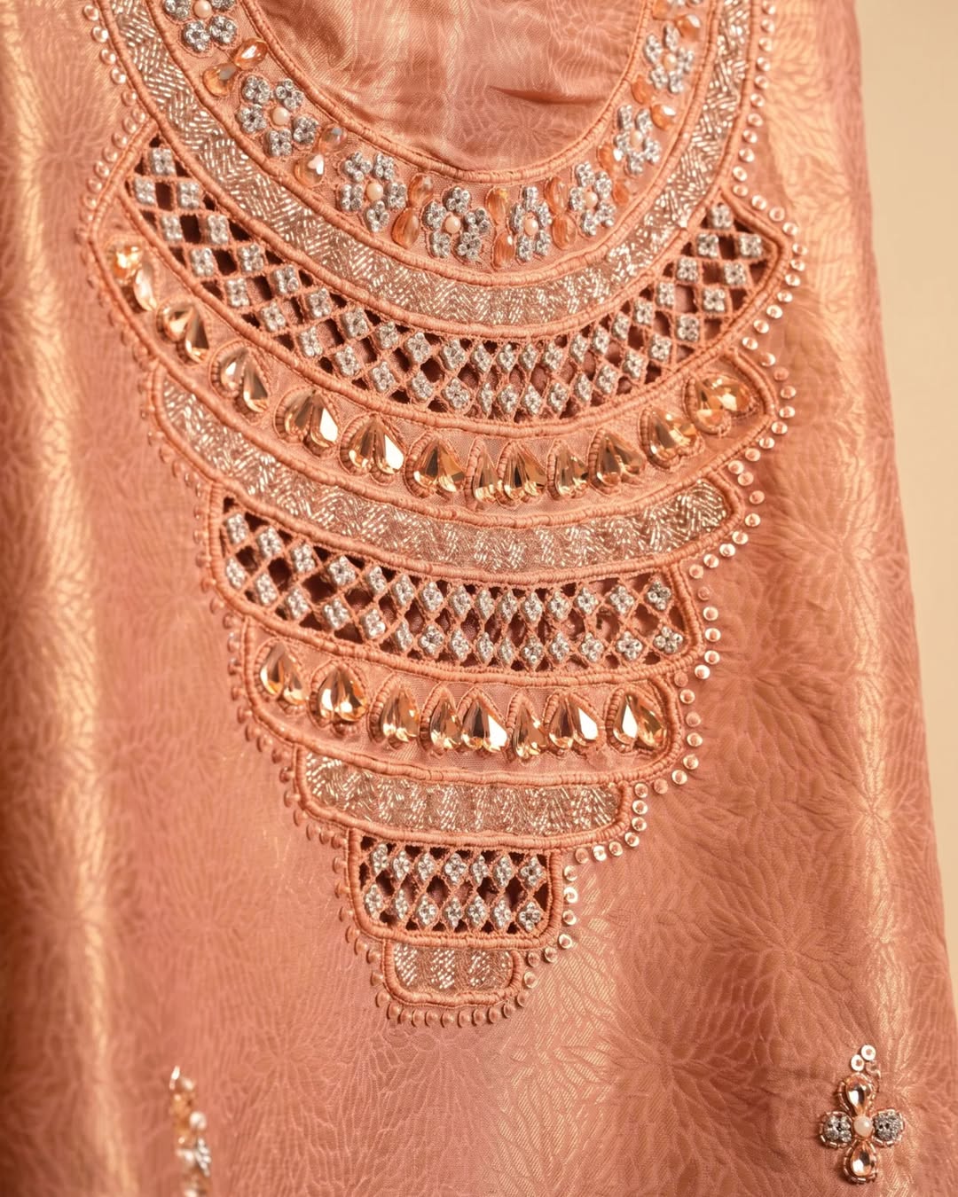 Peach Ornamental Neckline Suit Design